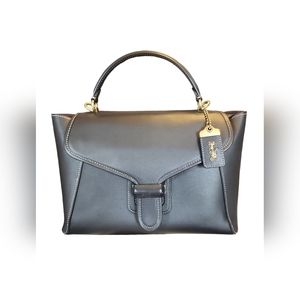 Elegant coach courier caryall purse